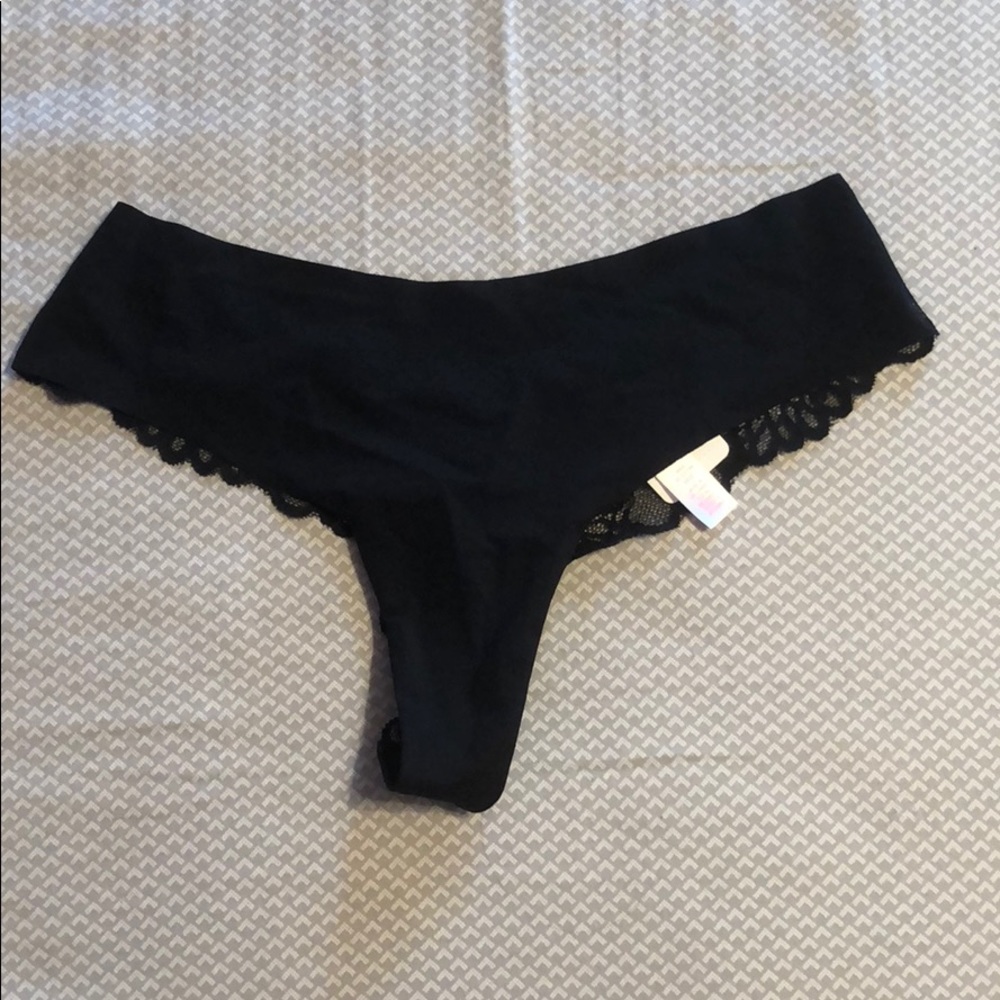 Black Victoria secret (pink) lace thong.